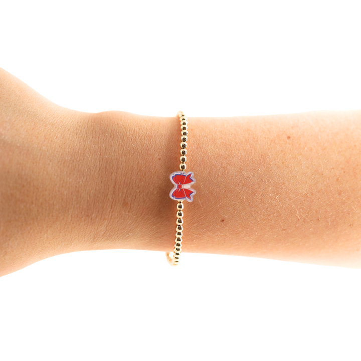 Beaded Blondes Red and Blue Bow Gold Bracelet